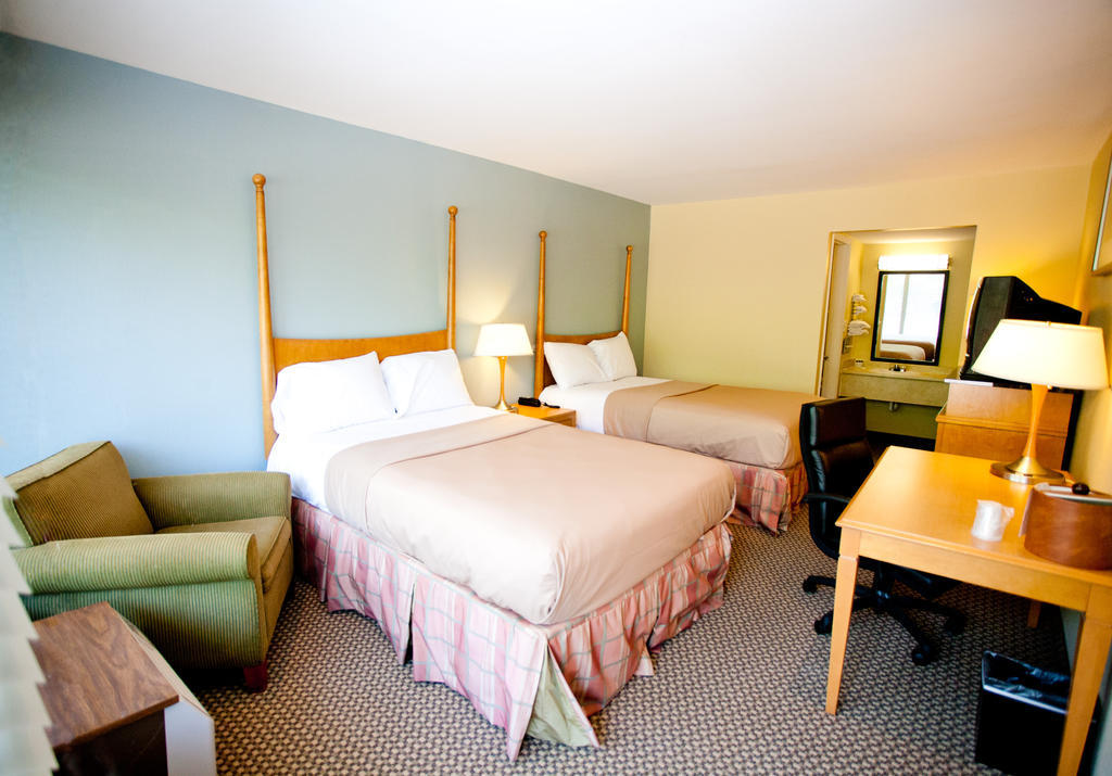 Star City Inn And Suites غروف سيتي الغرفة الصورة